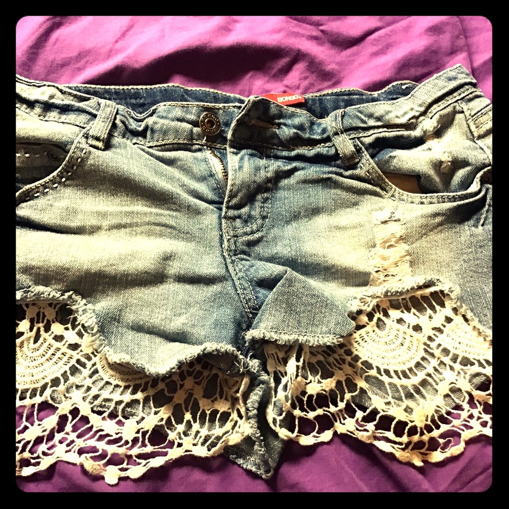 Denim shorts with white lace